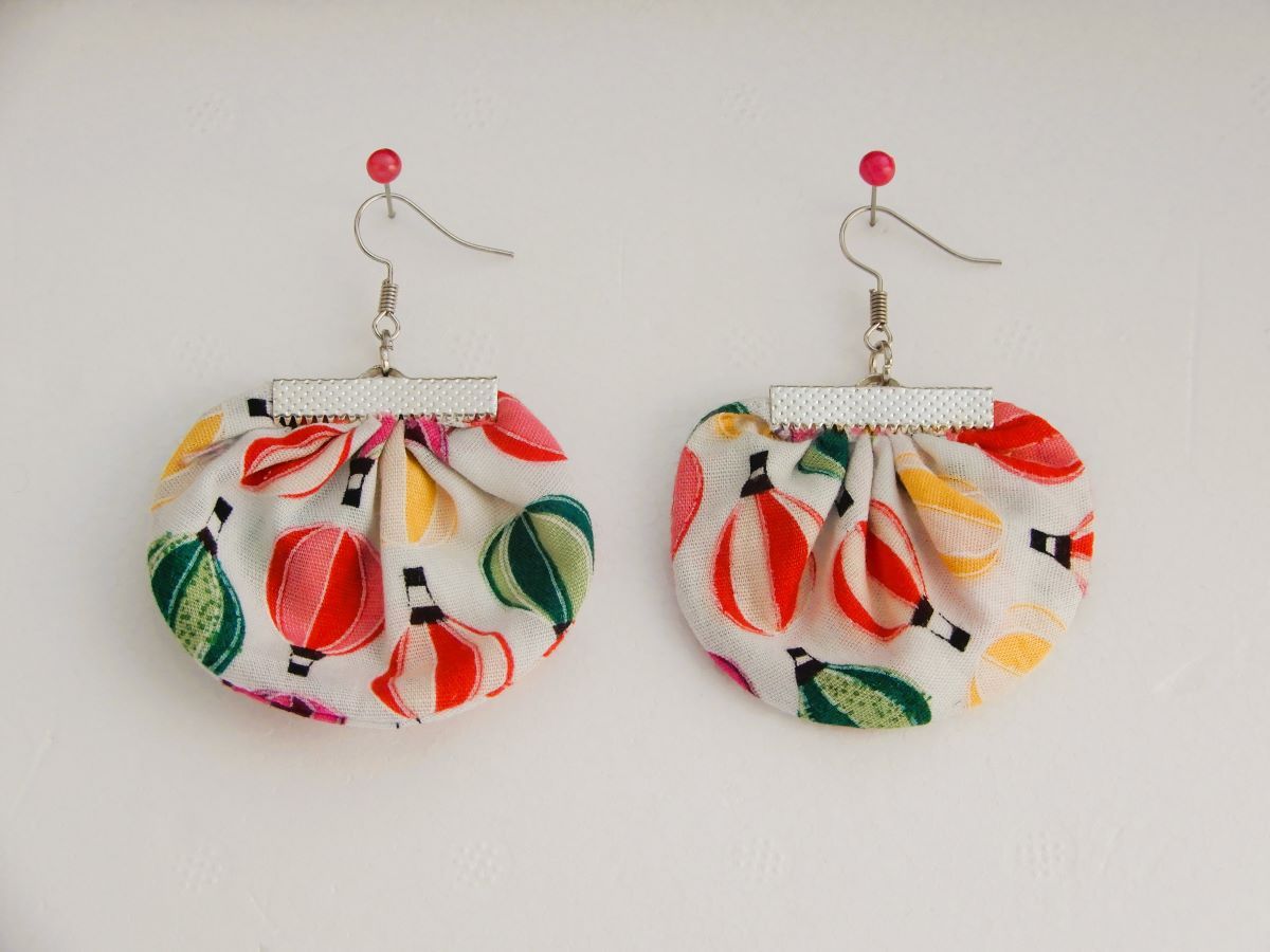 pendientes tela semicirculo globos