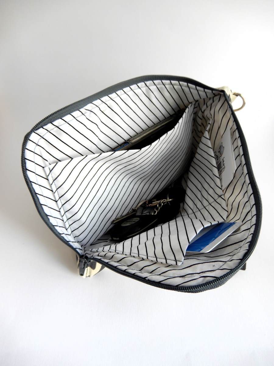 bolso clutch interior bolsillos 