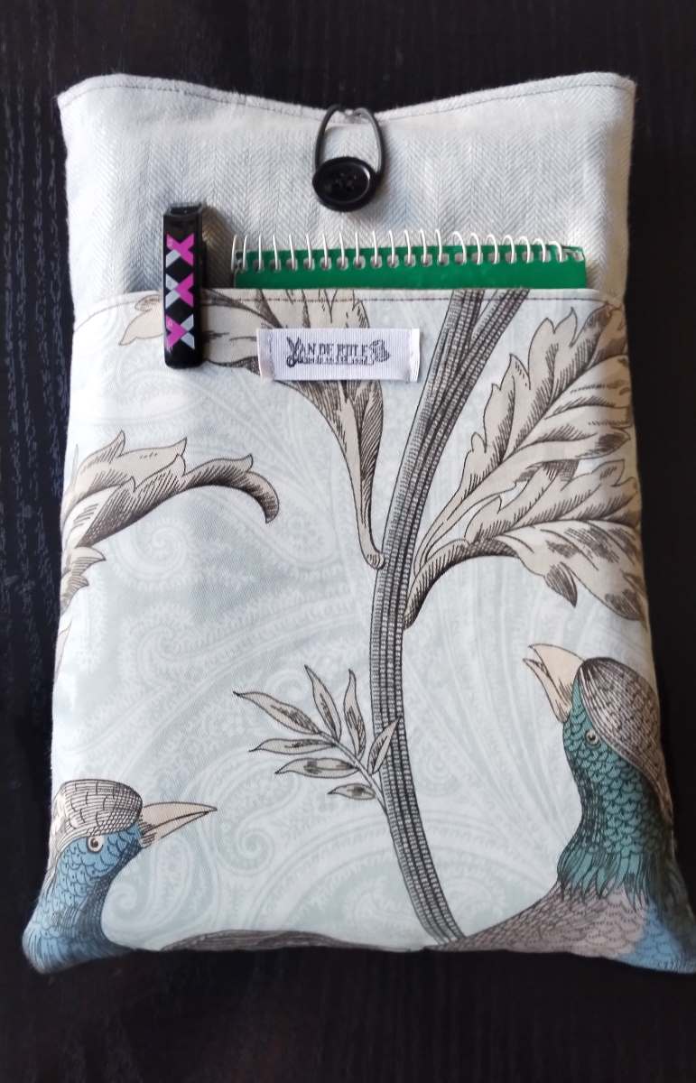 funda libro pajaros bolsillo exterior